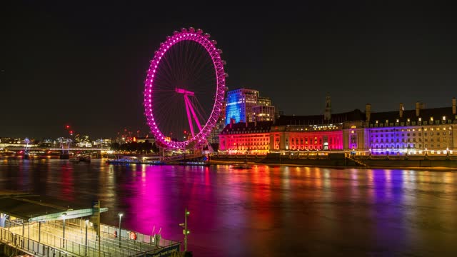 The London Eye lit pink at night