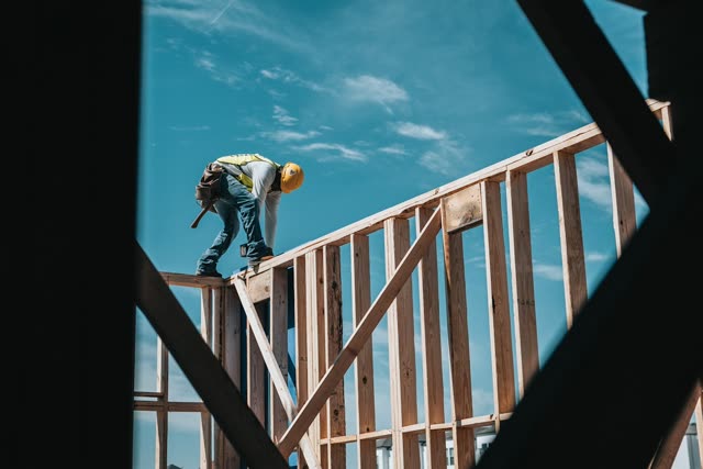 A builder working on site in a hard hat