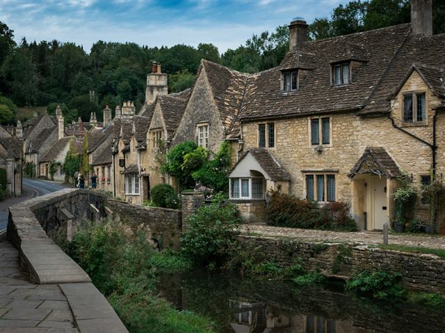 Castle Combe, a Cotswolds village beside the river